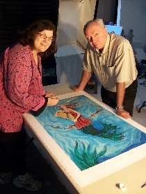 Carol Worthey enhances print / Error Higgins, Photographer